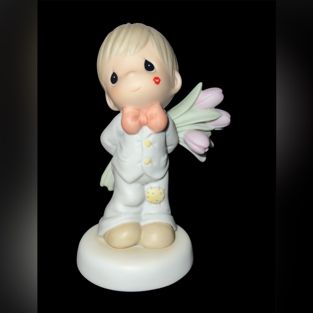 Precious Moments For The Sweetest Tu-Lips in Town Figurine.